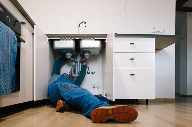 Professional Drain Cleaning technician working in Woodmere, NY
